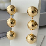 Gold ball long earrings