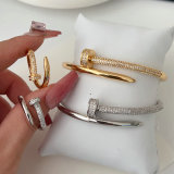Pave nail bangle with ring