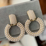 Round pearl earrings