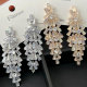Pave crystal leaf earrings