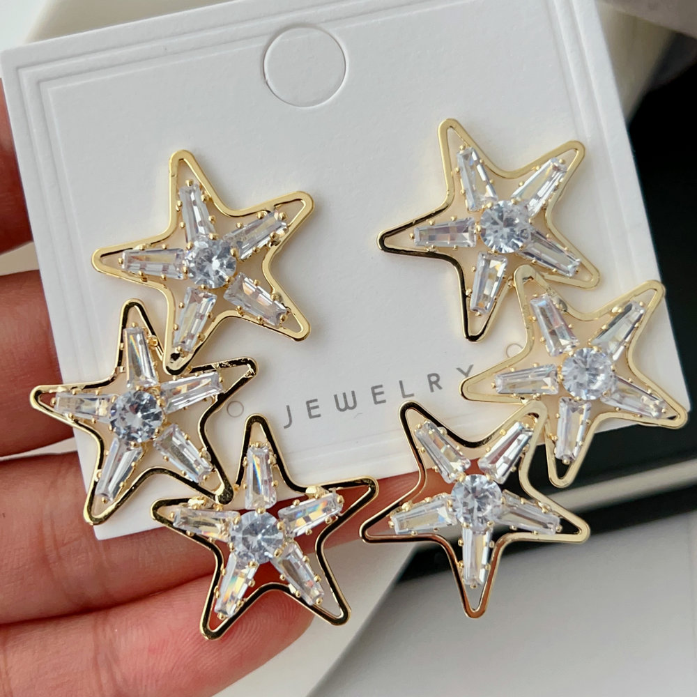 Pave crystal star earrings