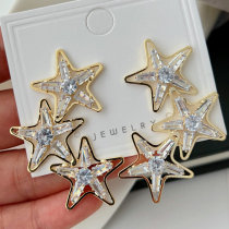 Pave crystal star earrings