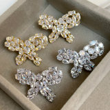 Pave bow earrings