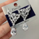 Pave triangle earrings