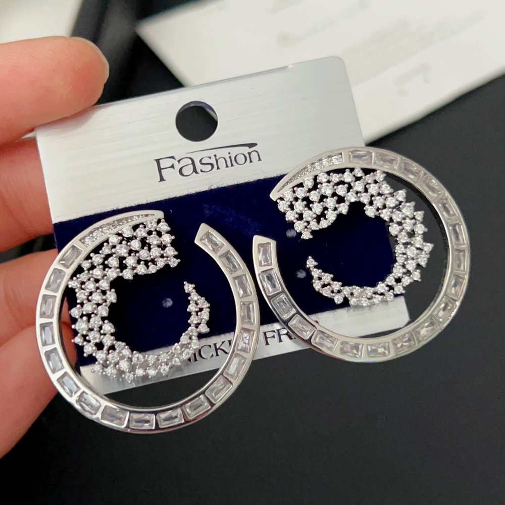 Pave zircon round flower earrings