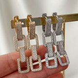Pave zircon chain long earrings