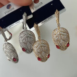 Red eye zircon earrings