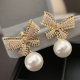 Pave zircon bow pearl earrings