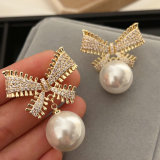 Pave zircon bow pearl earrings