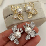 Pave flower pearl earrings