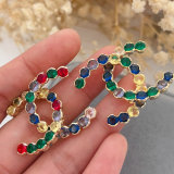 Pave colorful channel earrings