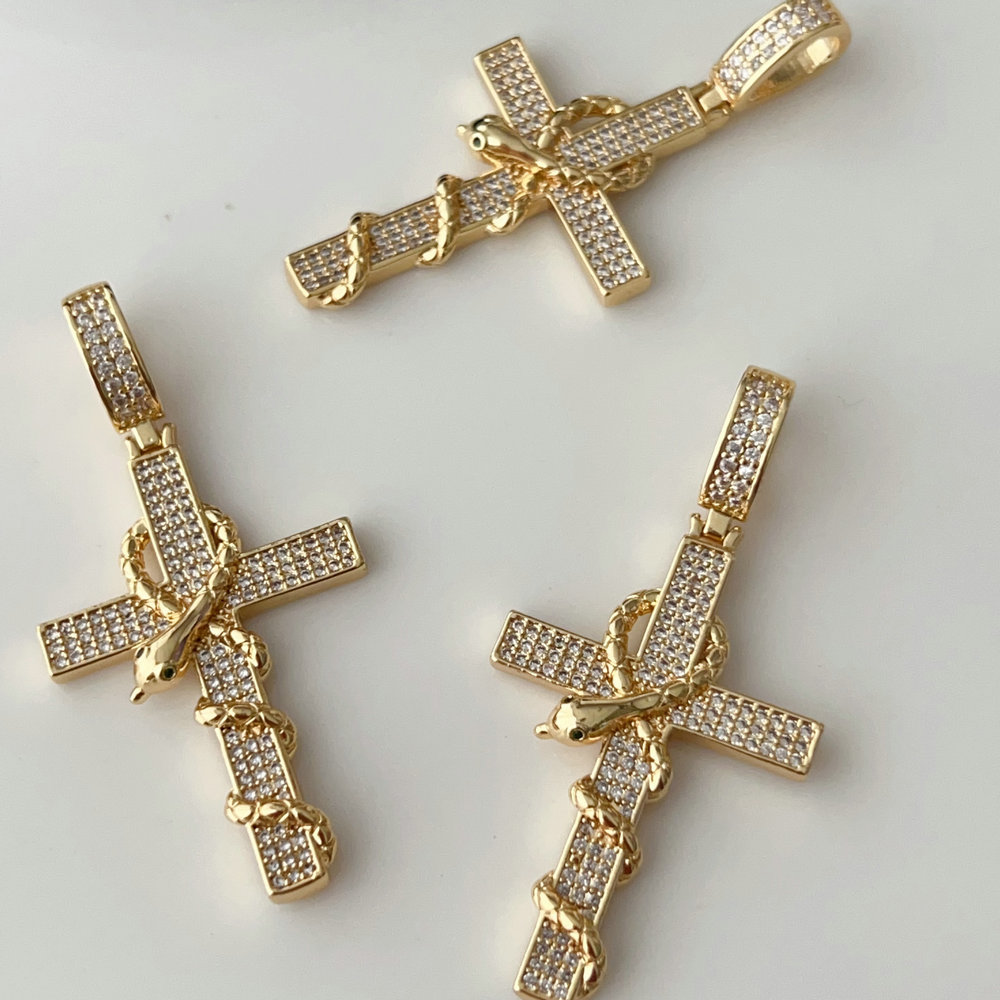 Pave snake cross pendant