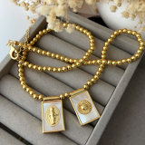 Gold bead with square charm necklace