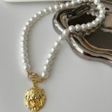 Shell pearl necklace with charm