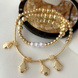 Brass bead bracelet with hand charm