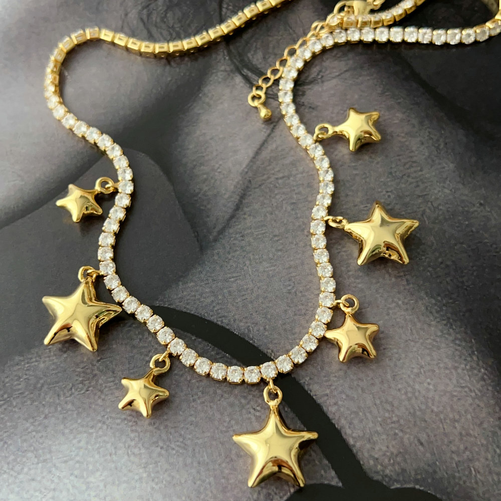 Tennis chain with star charm