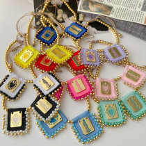 Gold bead with square handmade charm