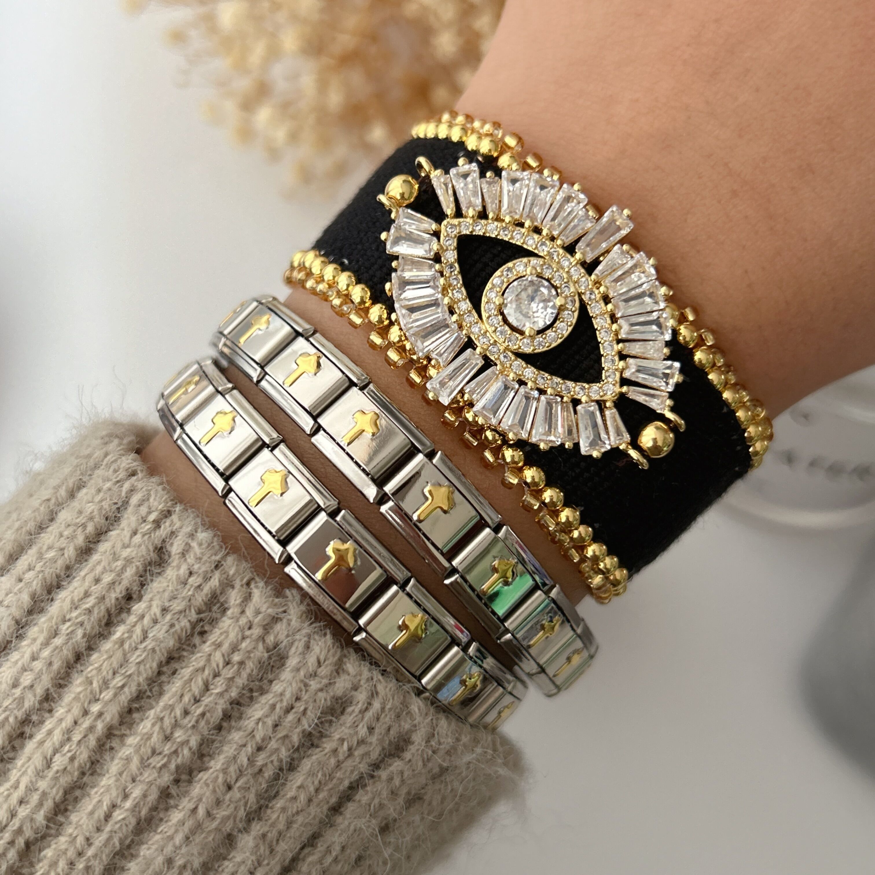 Black cord bracelet with eye charm