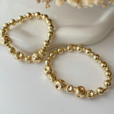 Gold bead spring bracelet