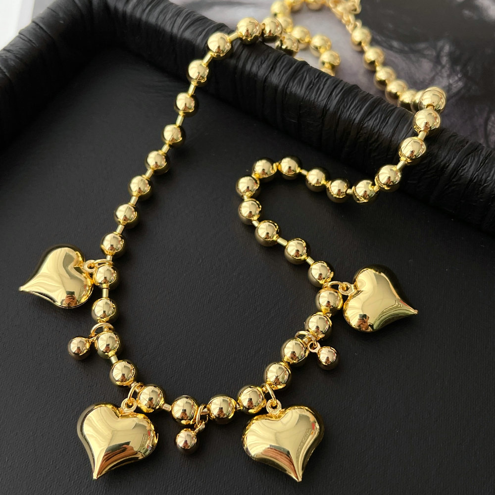 Bead ball necklace with heart charm
