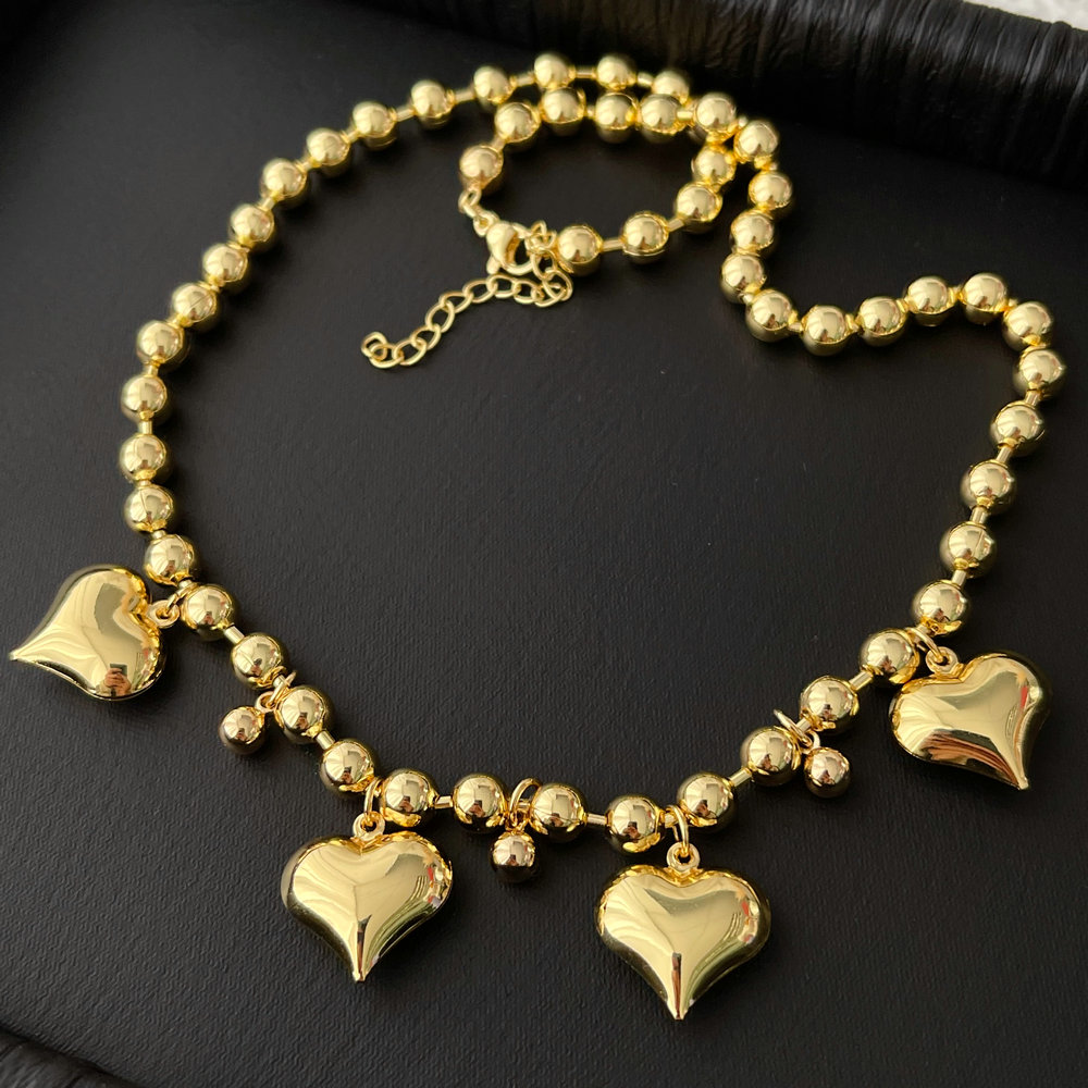 Bead ball necklace with heart charm