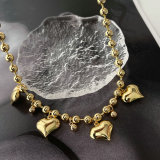 Bead ball necklace with heart charm