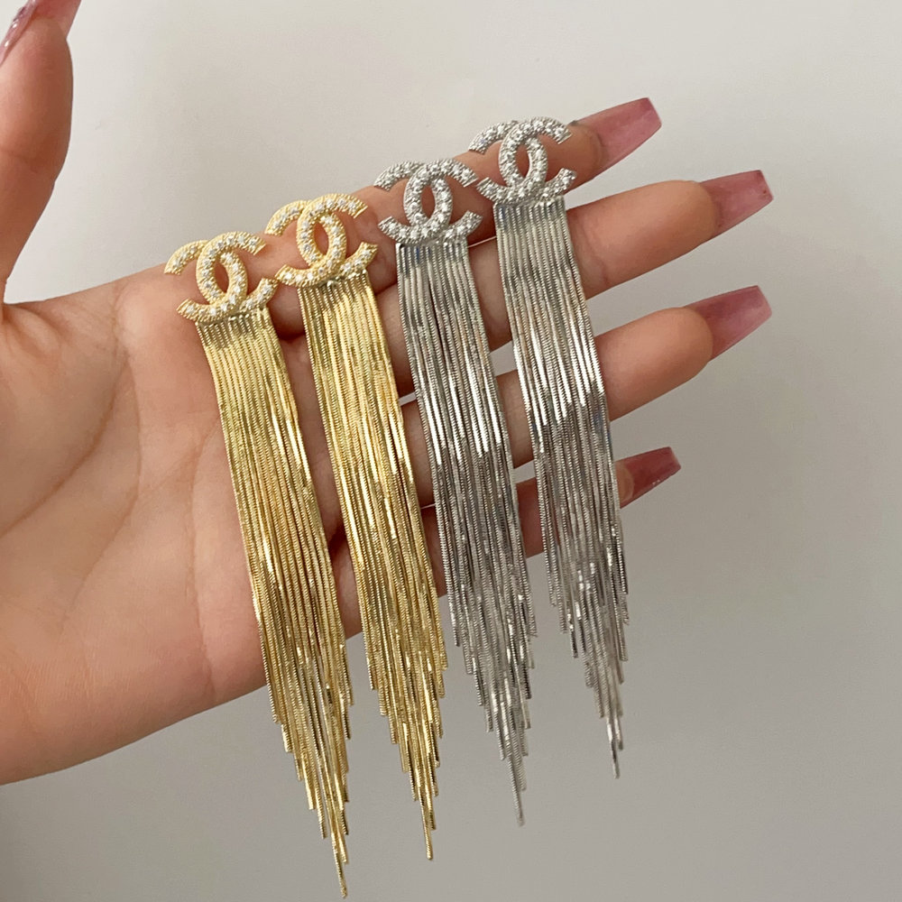 Channel tassel earrings