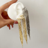 Channel tassel earrings