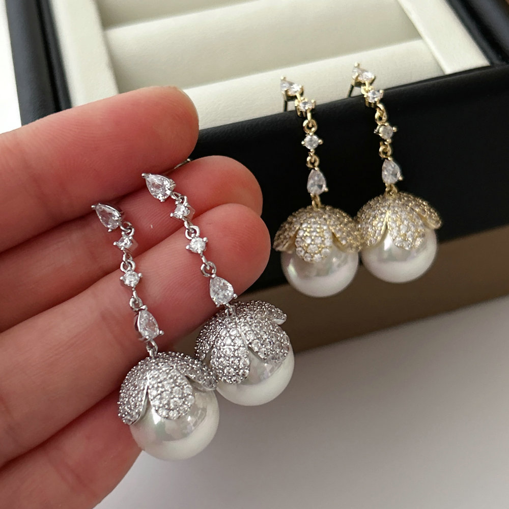 Long drop pearl earrings