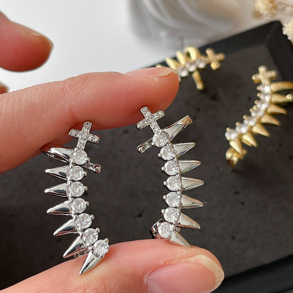 Pave arrow cross earrings