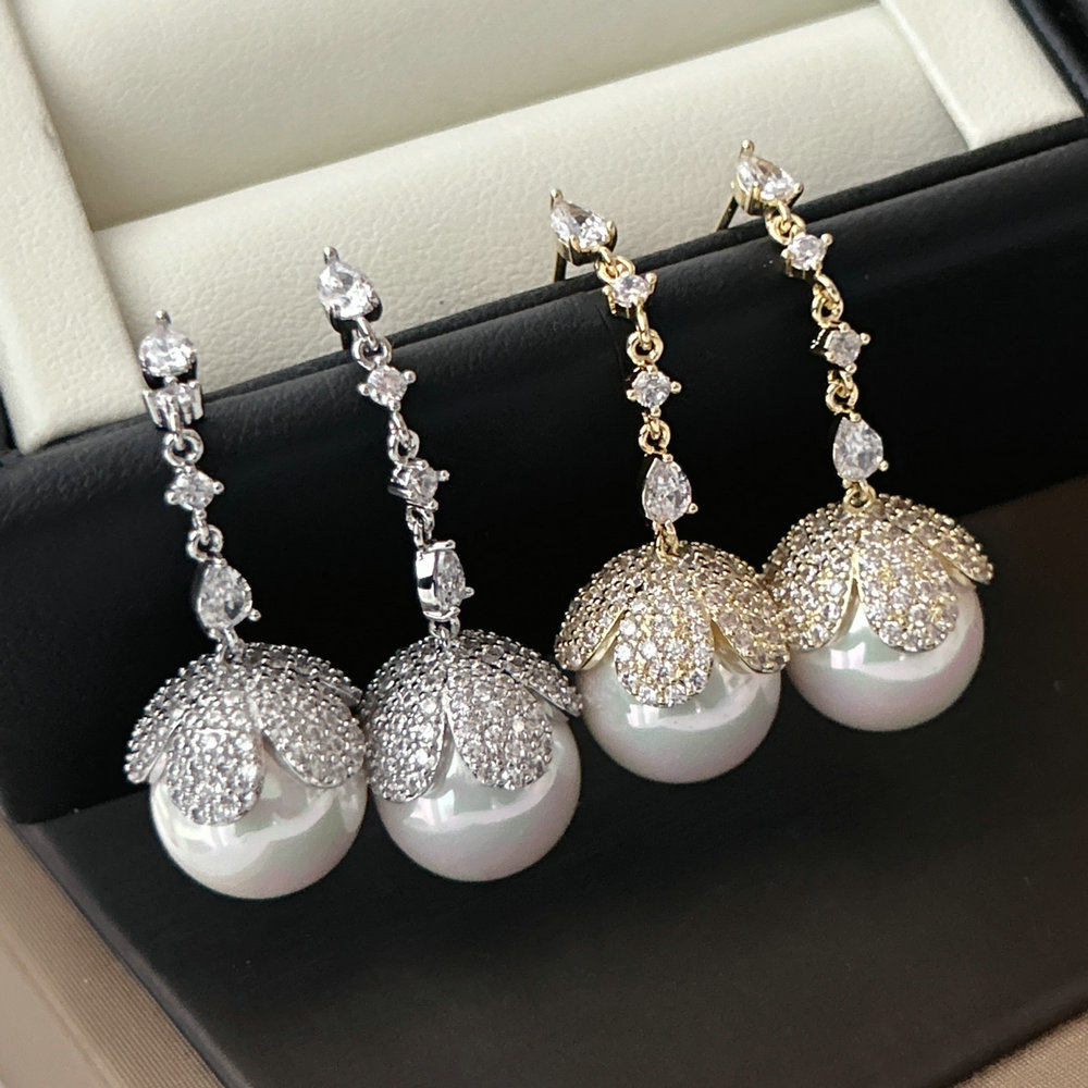 Long drop pearl earrings