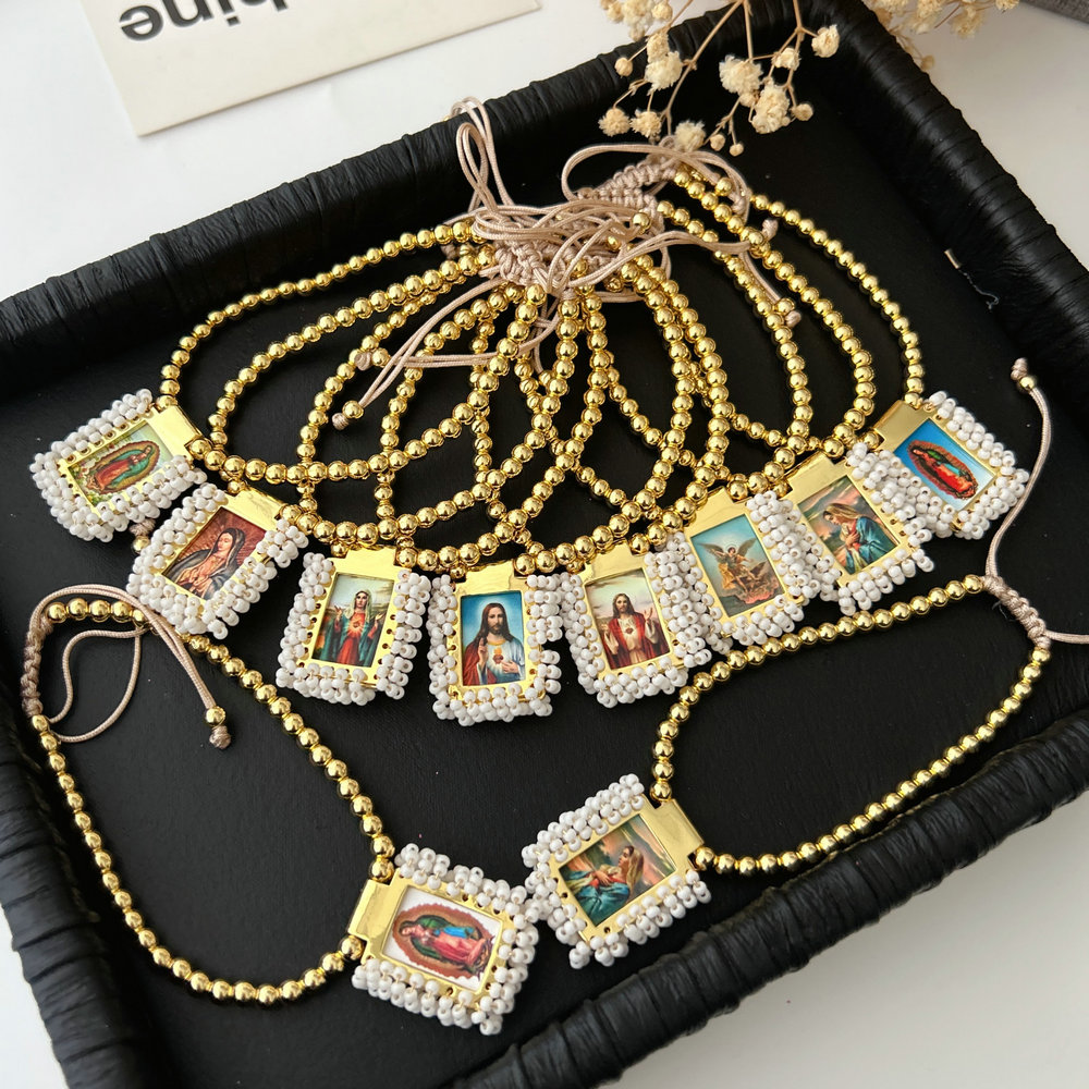 Handmade white bead religious pendant bracelet