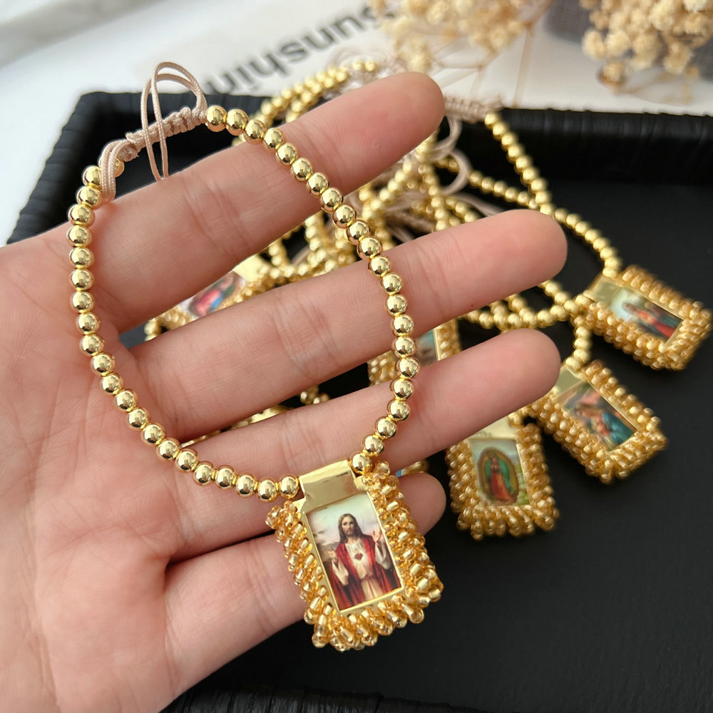 Handmade gold bead religious pendant bracelet