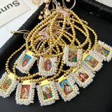 Handmade white bead religious pendant bracelet