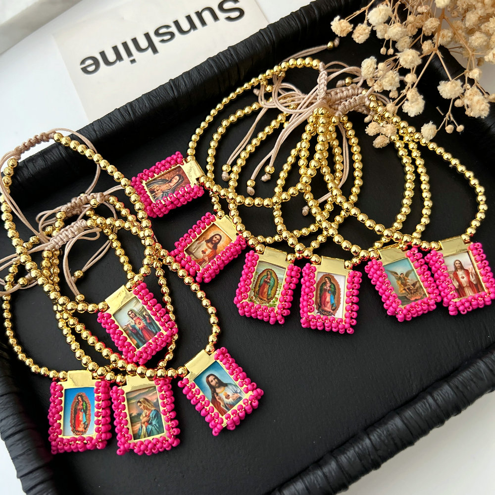 Handmade pink bead religious pendant bracelet