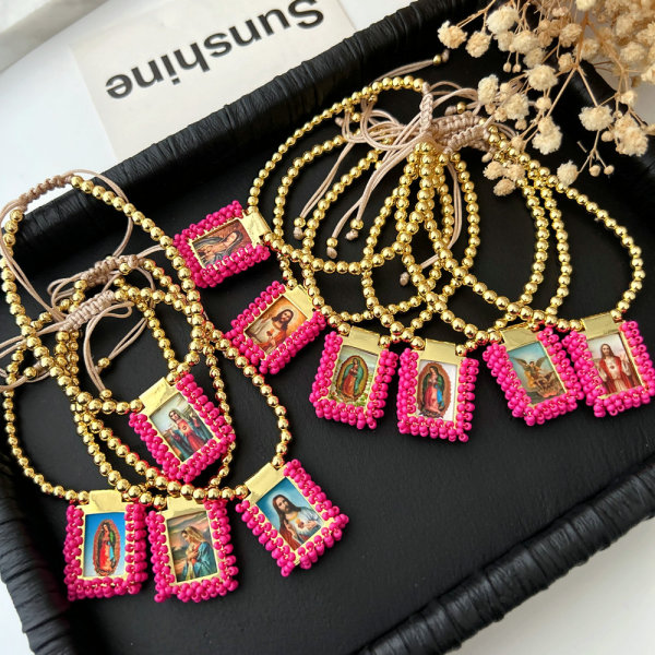 Handmade pink bead religious pendant bracelet