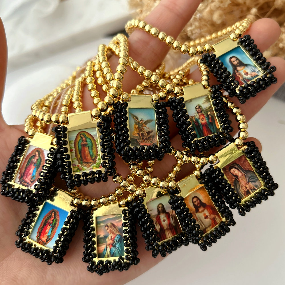 Handmade black bead religious pendant bracelet