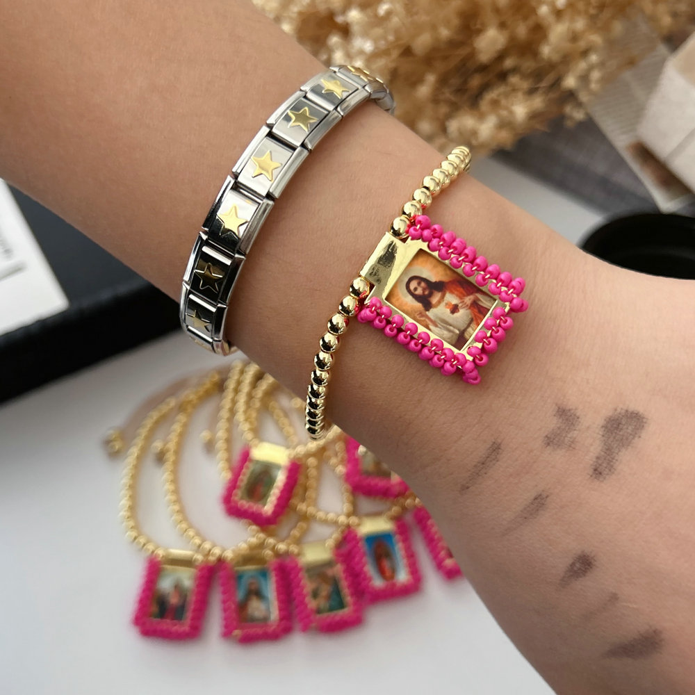 Handmade pink bead religious pendant bracelet