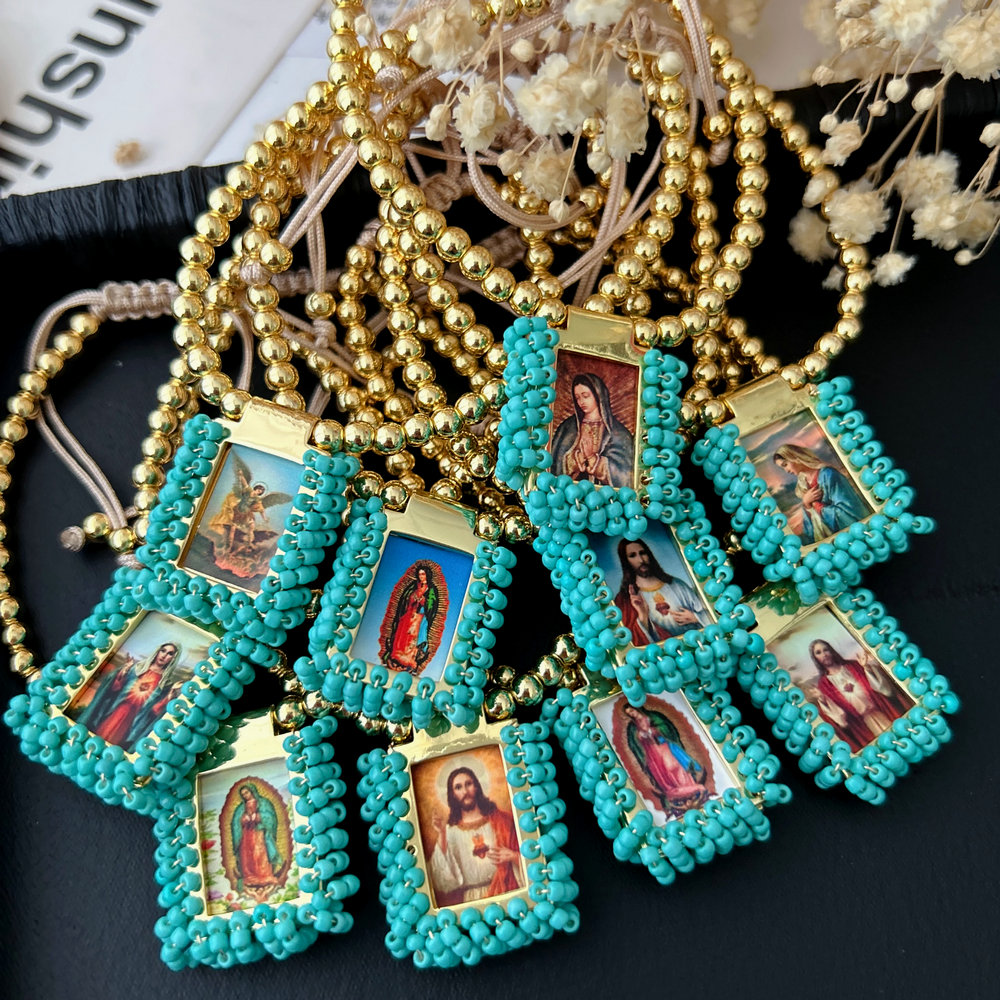 Handmade blue bead religious pendant bracelet