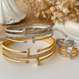 Pave nail set bangle with ring