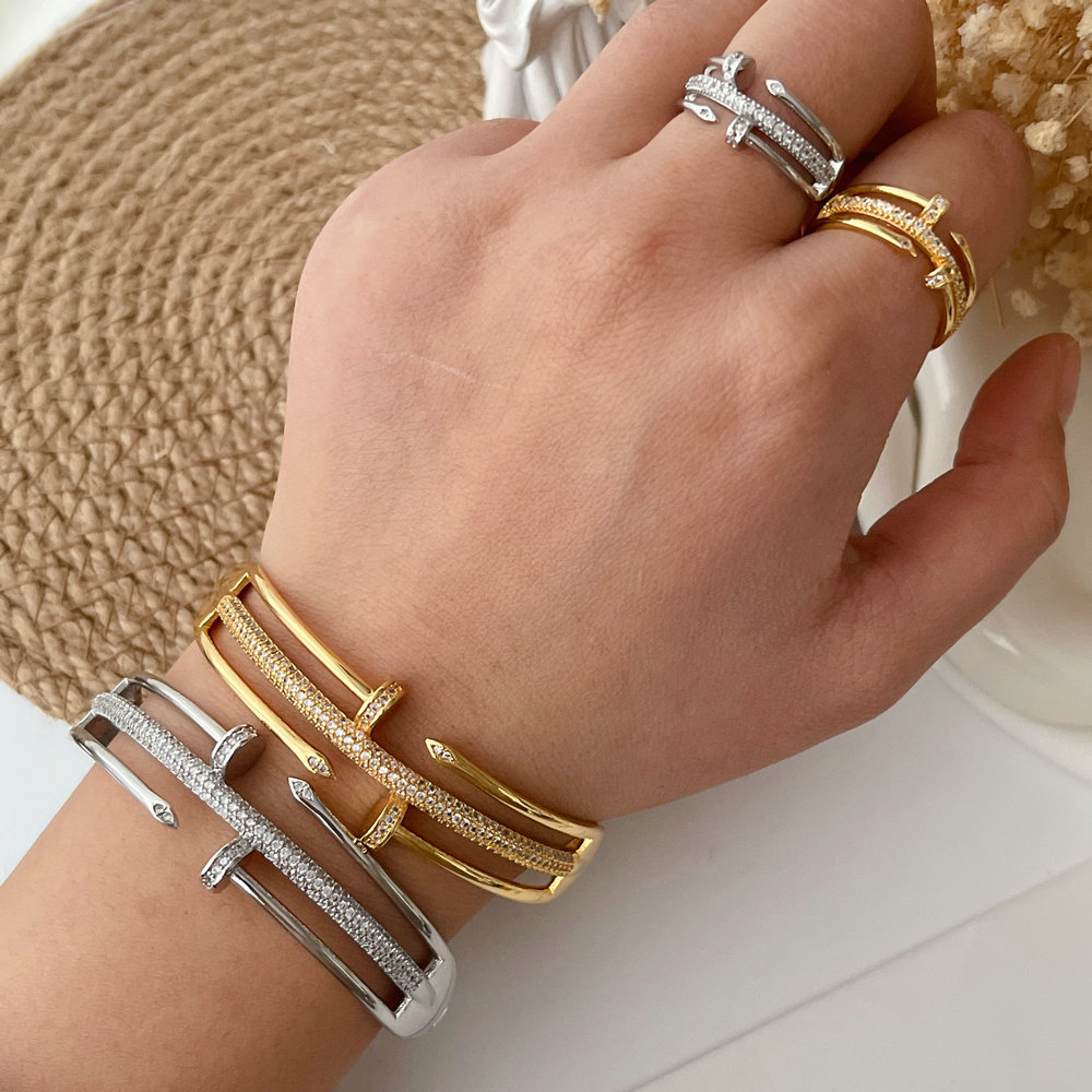 Pave nail set bangle with ring