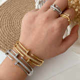 Pave nail set bangle with ring