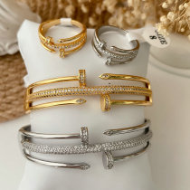 Pave nail set bangle with ring