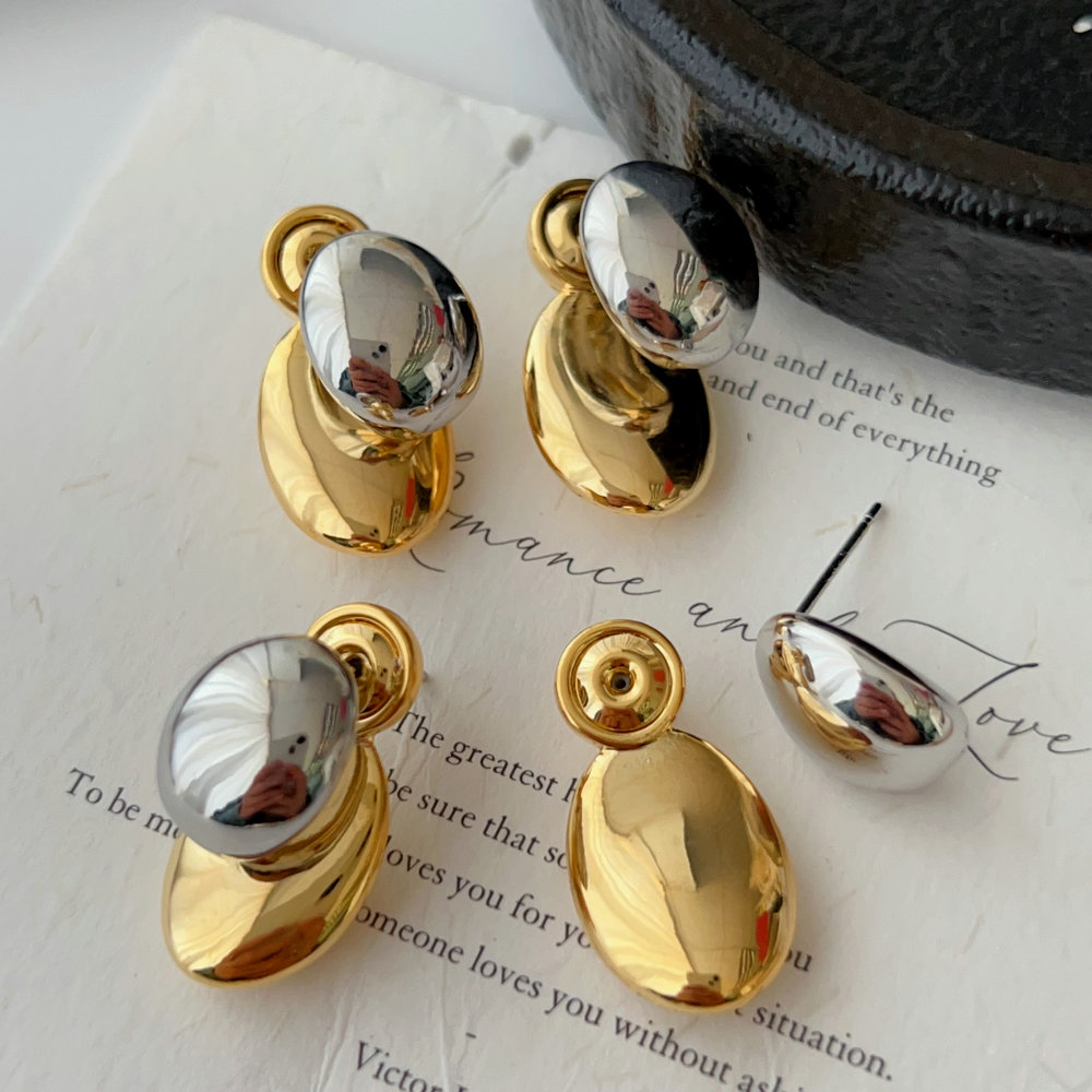Oval silver and gold color earrings