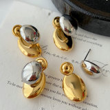 Oval silver and gold color earrings