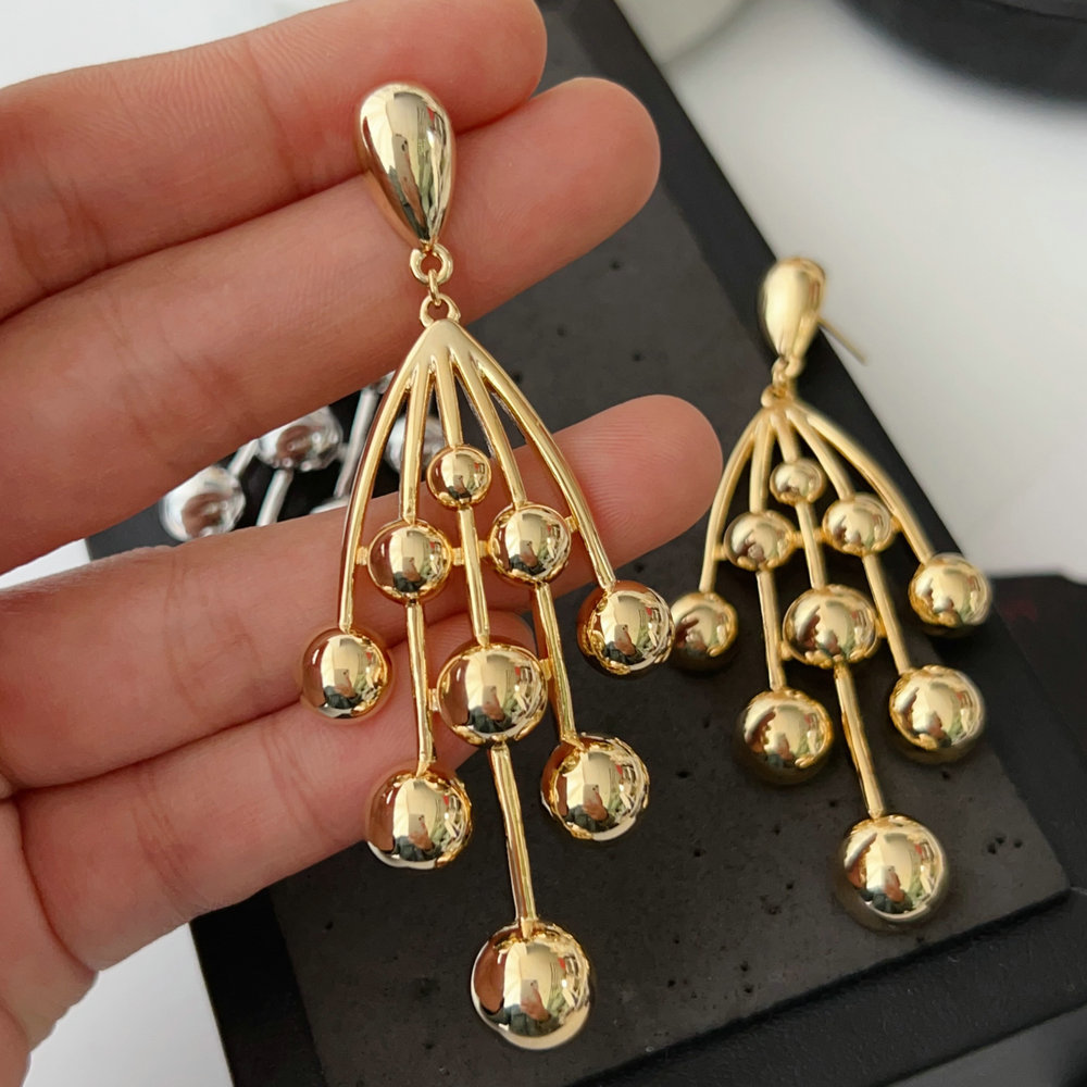Ball charm earrings