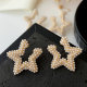 Full pearl star earrings
