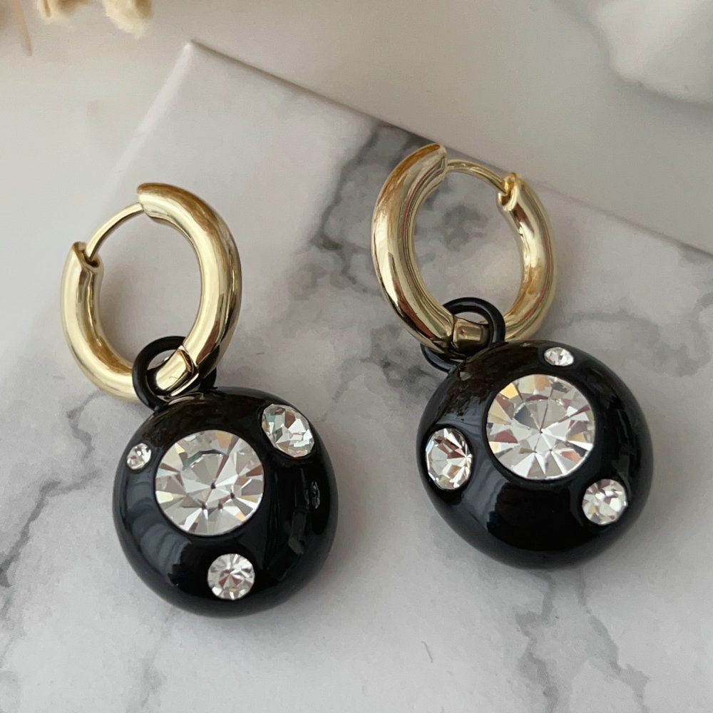 Black charm drop earrings