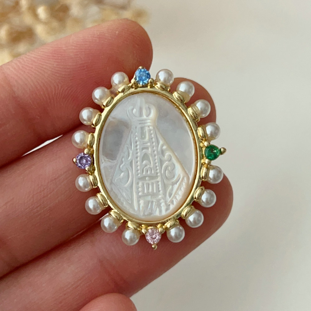 Pearl religion charm