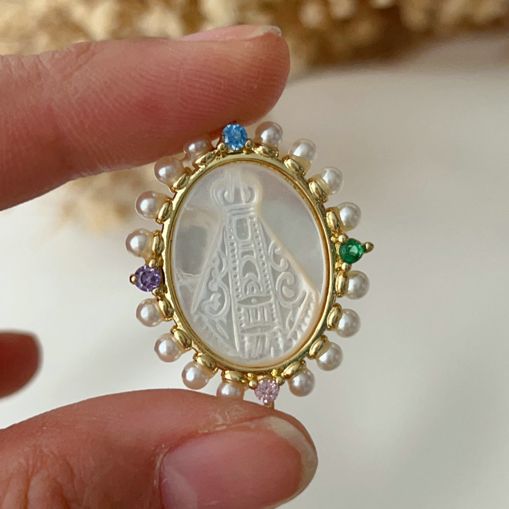 Pearl religion charm
